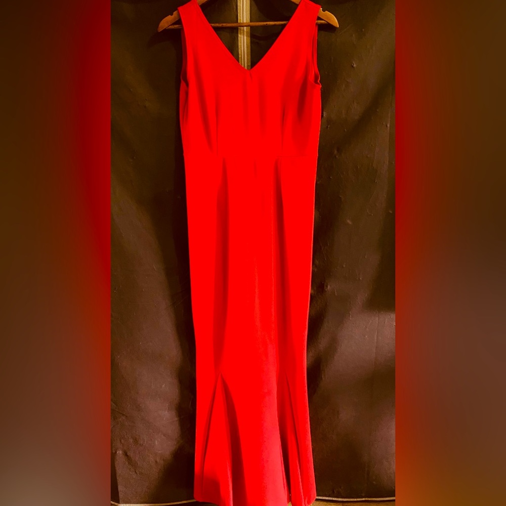 Tailored red floor length dress. Zippered back and v-cut sleeveless. Large